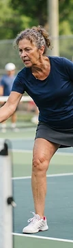 Pickleball player gripping a paddle