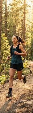 Runner on a forested trail near Nevada City