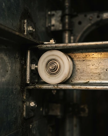 Rollers & Tracks garage door component close-up