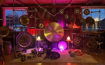 Gongs and sound instruments arranged inside The Organ Barn