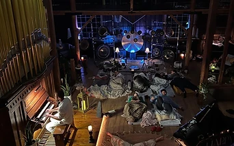 A sound bath viewed from the loft
