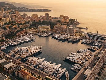 Aerial view of Monaco harbor with superyachts