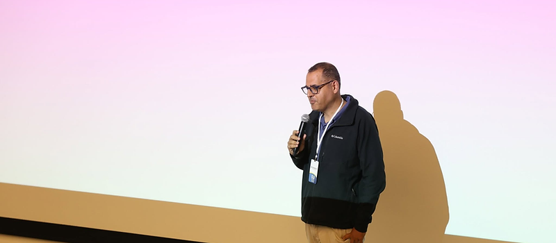 Dr. Amir Tal speaking to an audience