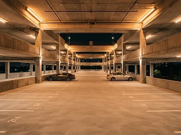 Well-lit modern parking structure at night
