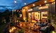 Warm outdoor lighting on a deck at dusk