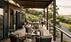 Covered wooden deck with steel posts