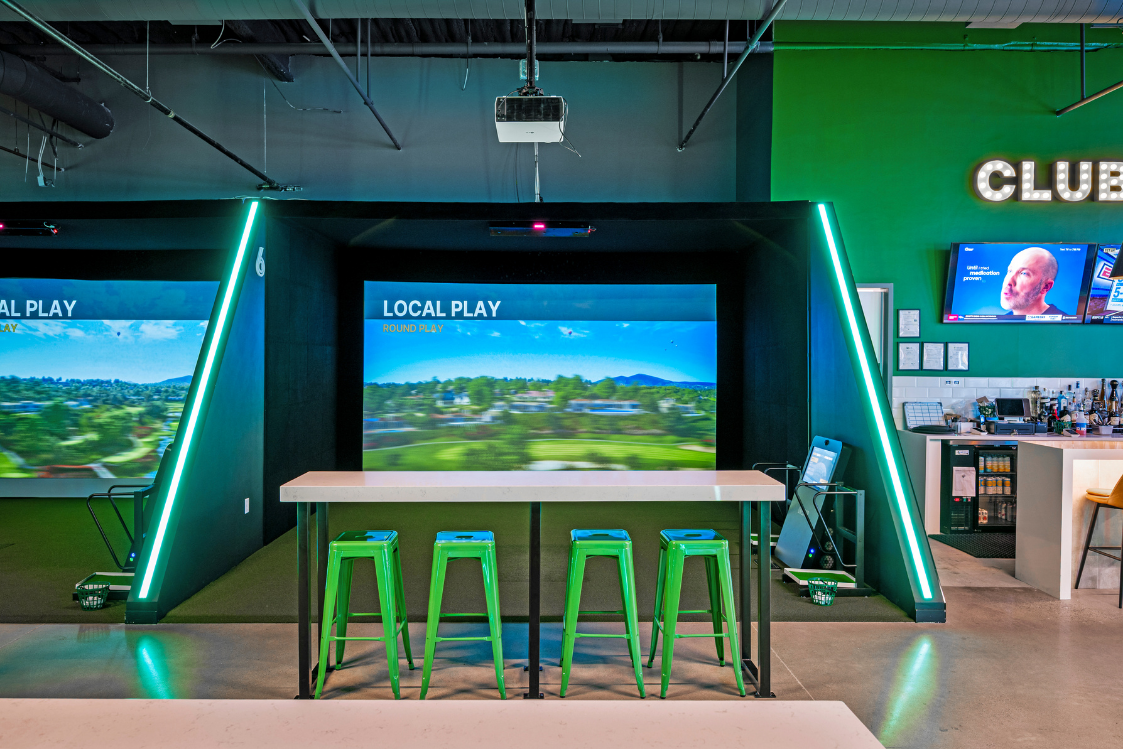 Good Time Golf simulator bays and clubhouse bar at Assembly Row