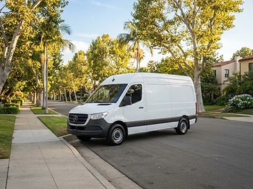 Clean delivery van parked on a sunny street