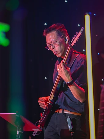 Ken Chow, Bass & Saxophone of GAME ON
