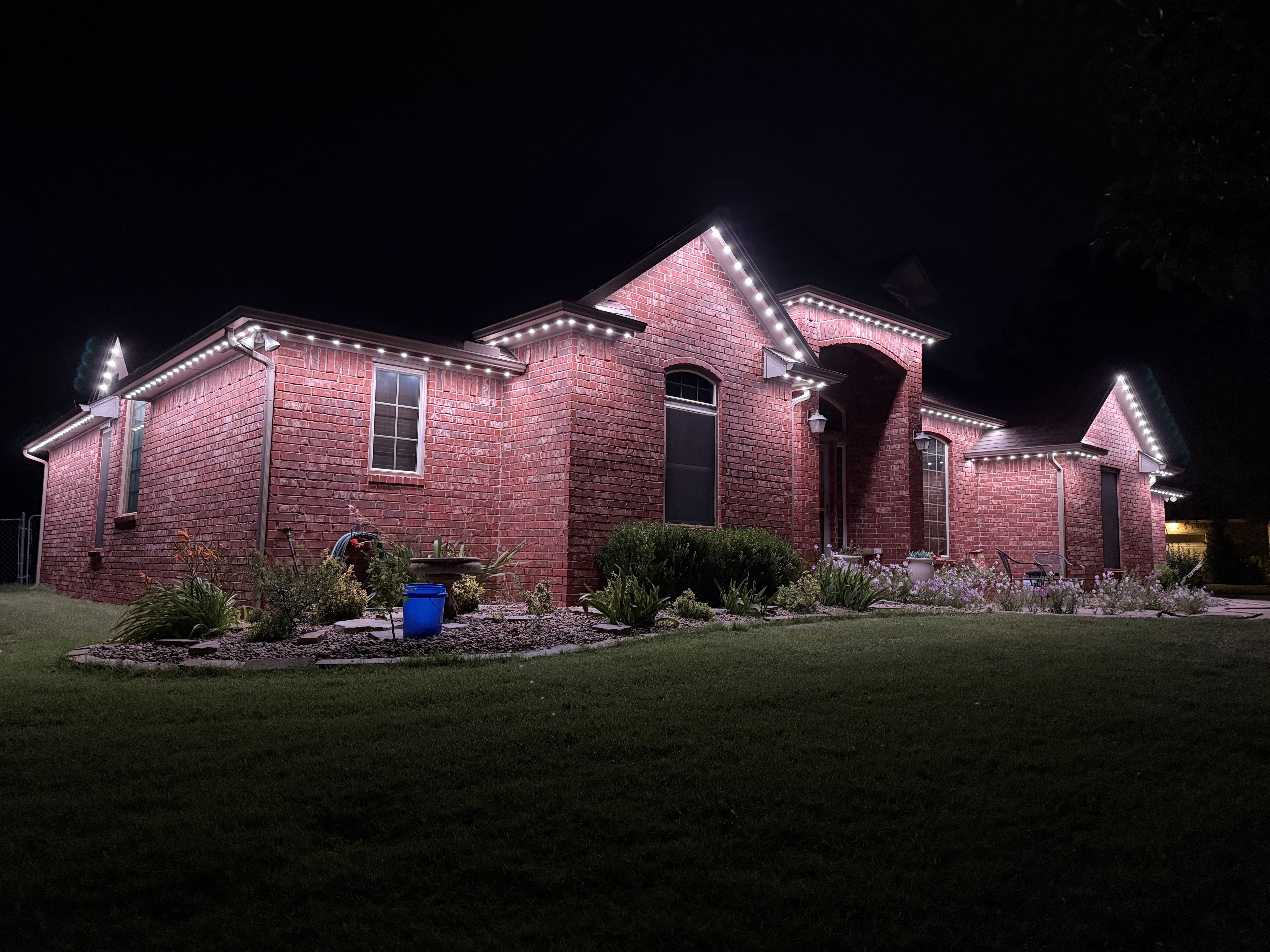 Same home illuminated in different architectural lighting scenes