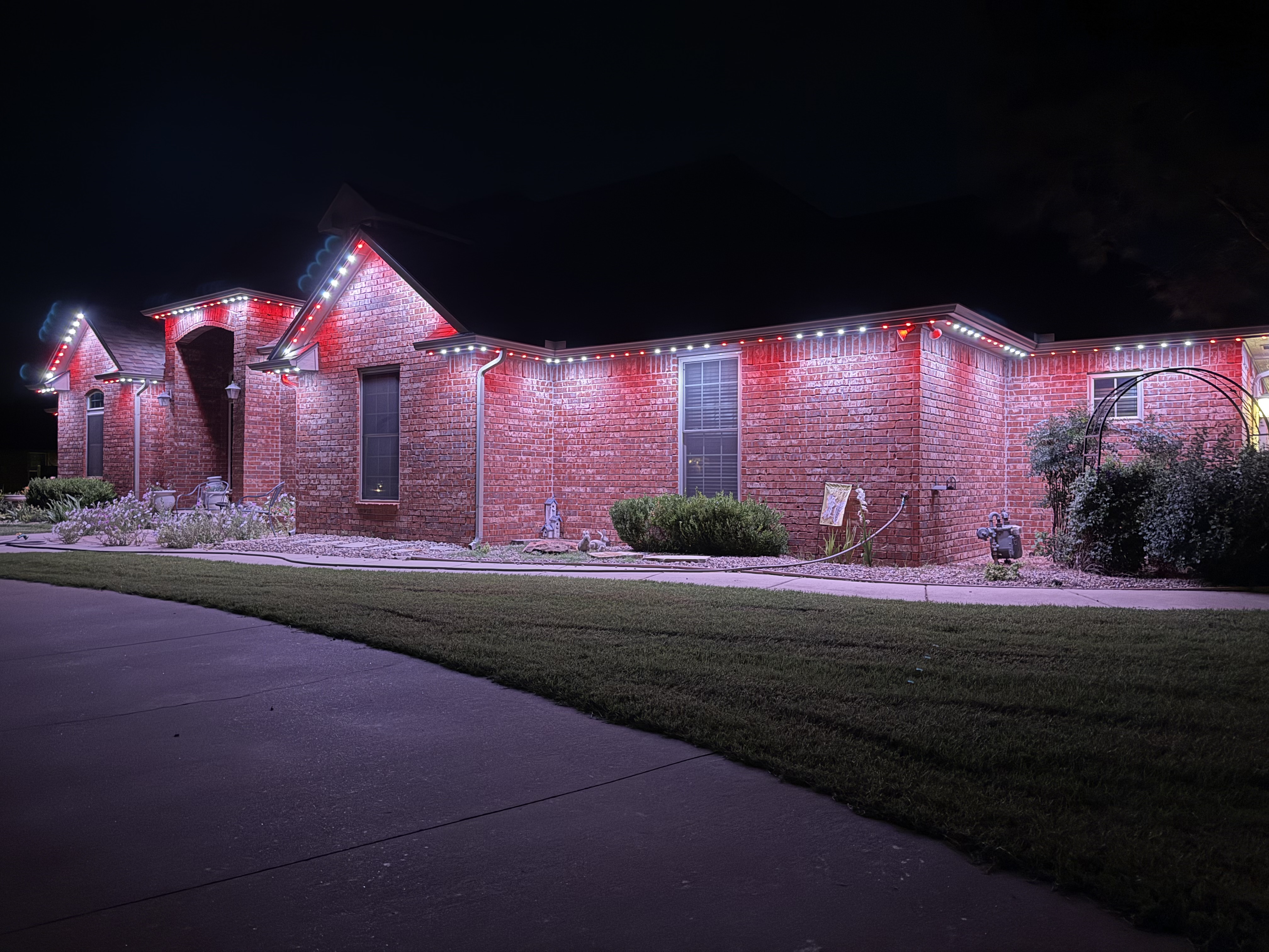 Same home illuminated in different architectural lighting scenes
