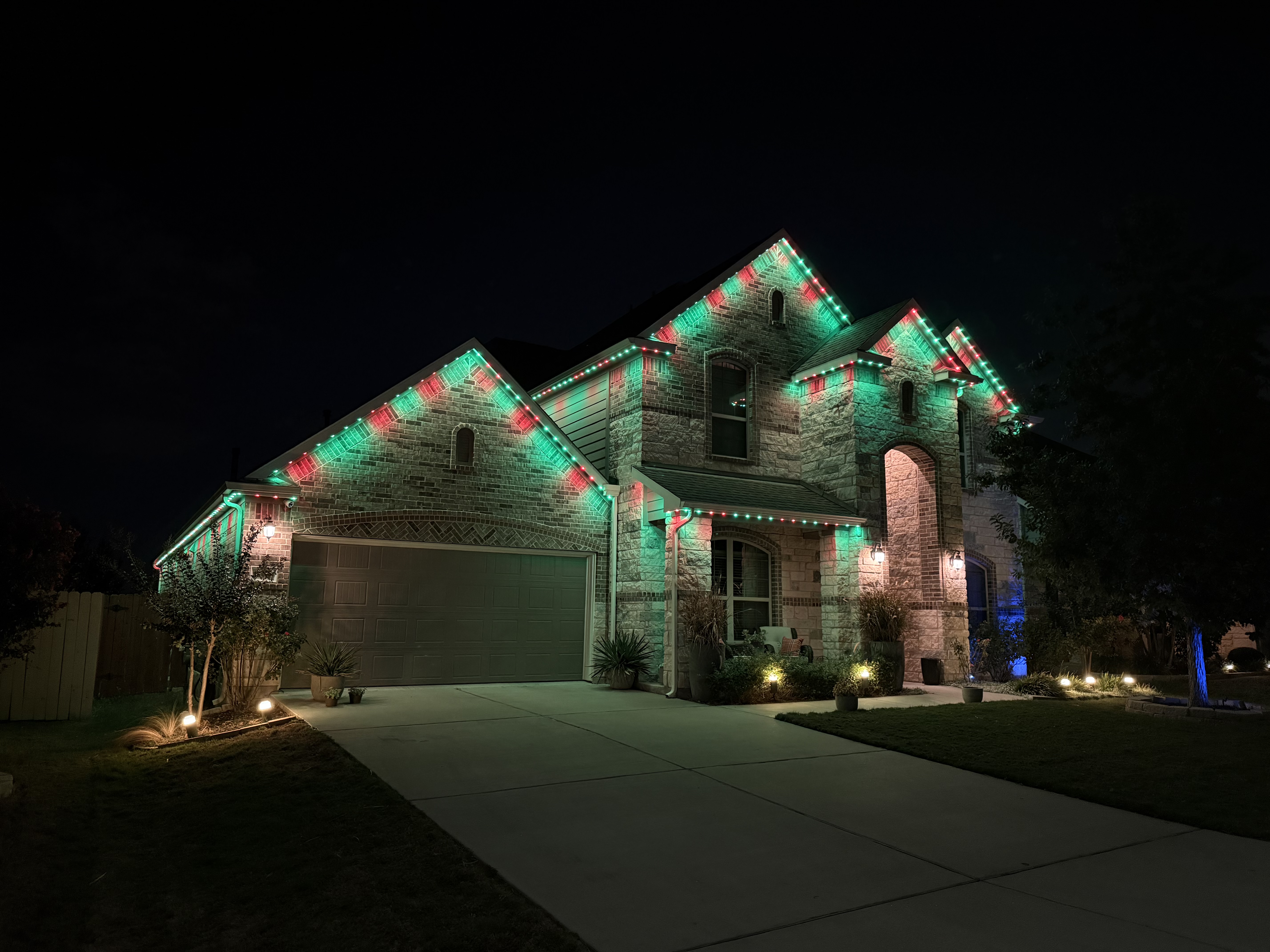 Same home illuminated in different architectural lighting scenes