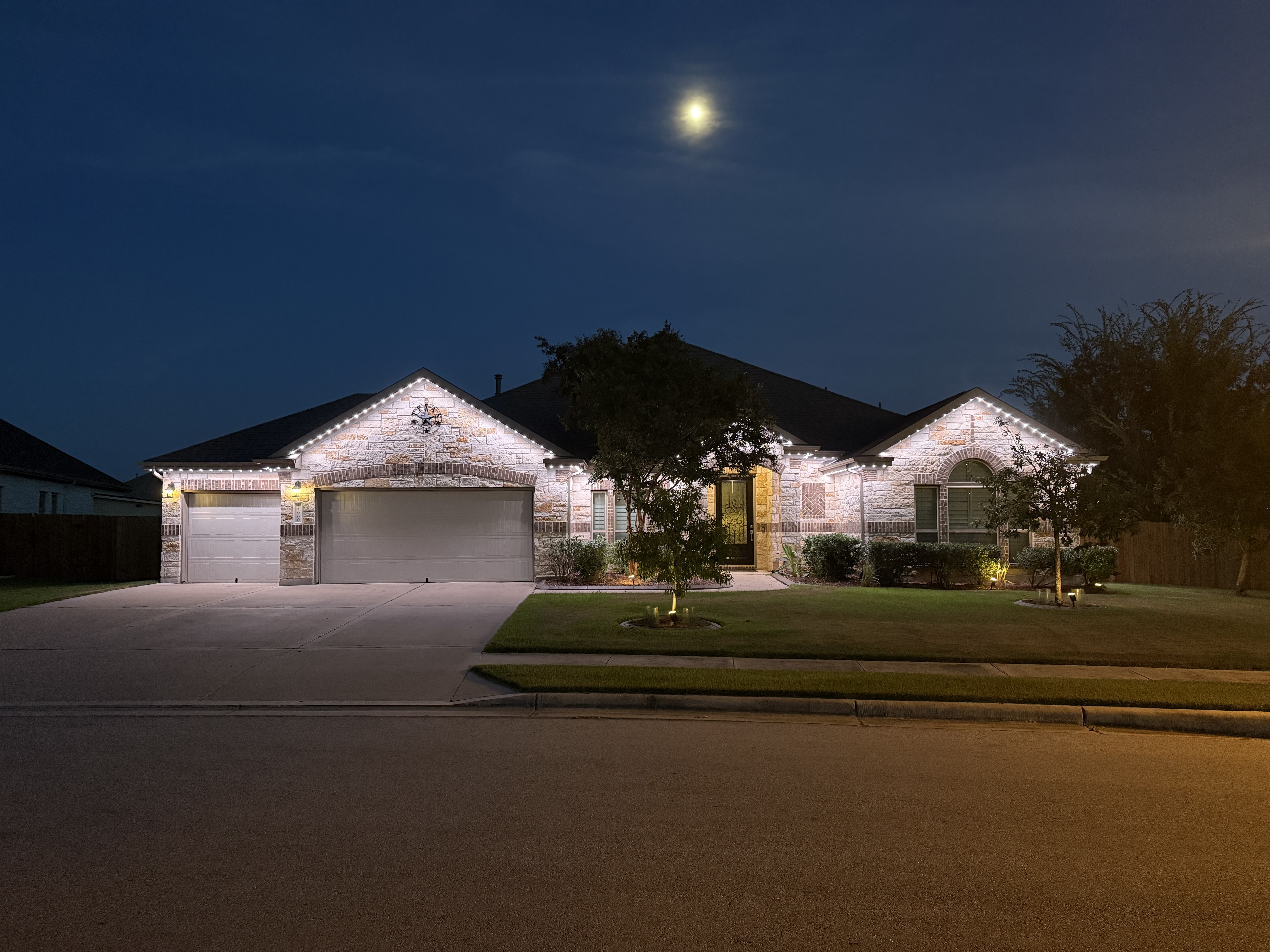 Same home illuminated in different architectural lighting scenes