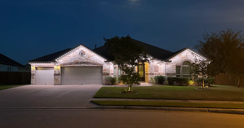 Luxury estate illuminated at dusk