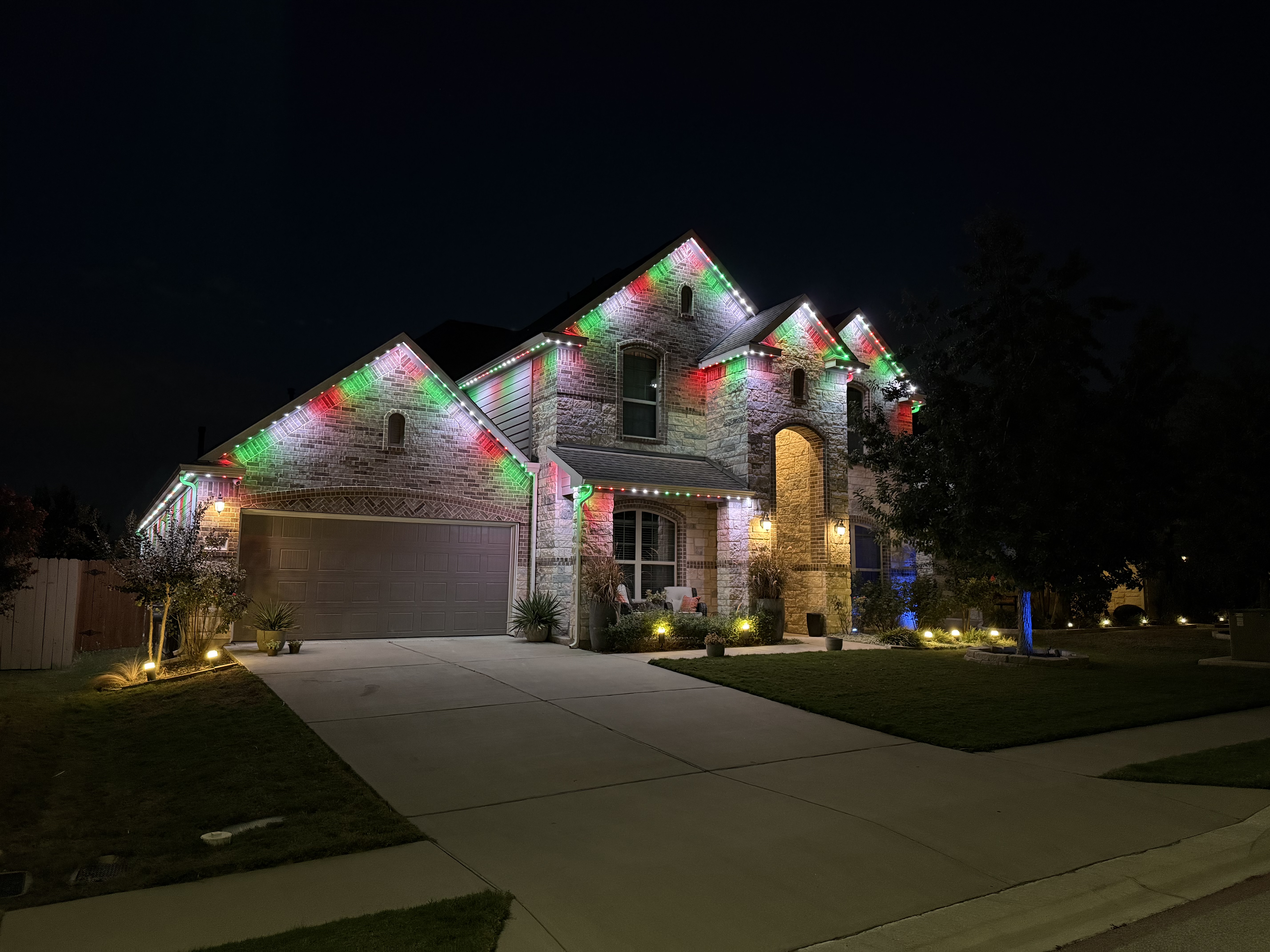 Same home illuminated in different architectural lighting scenes