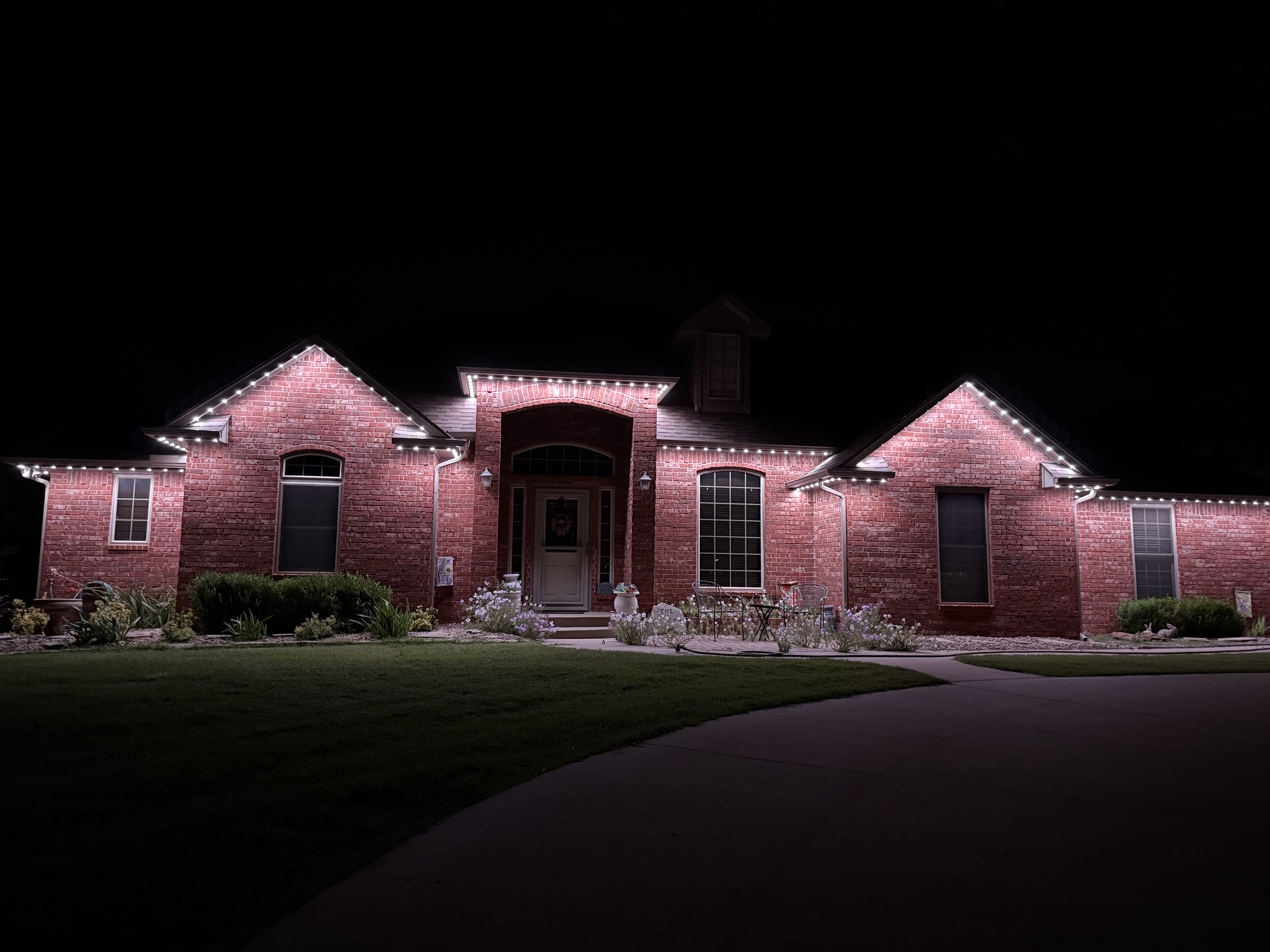Same home illuminated in different architectural lighting scenes