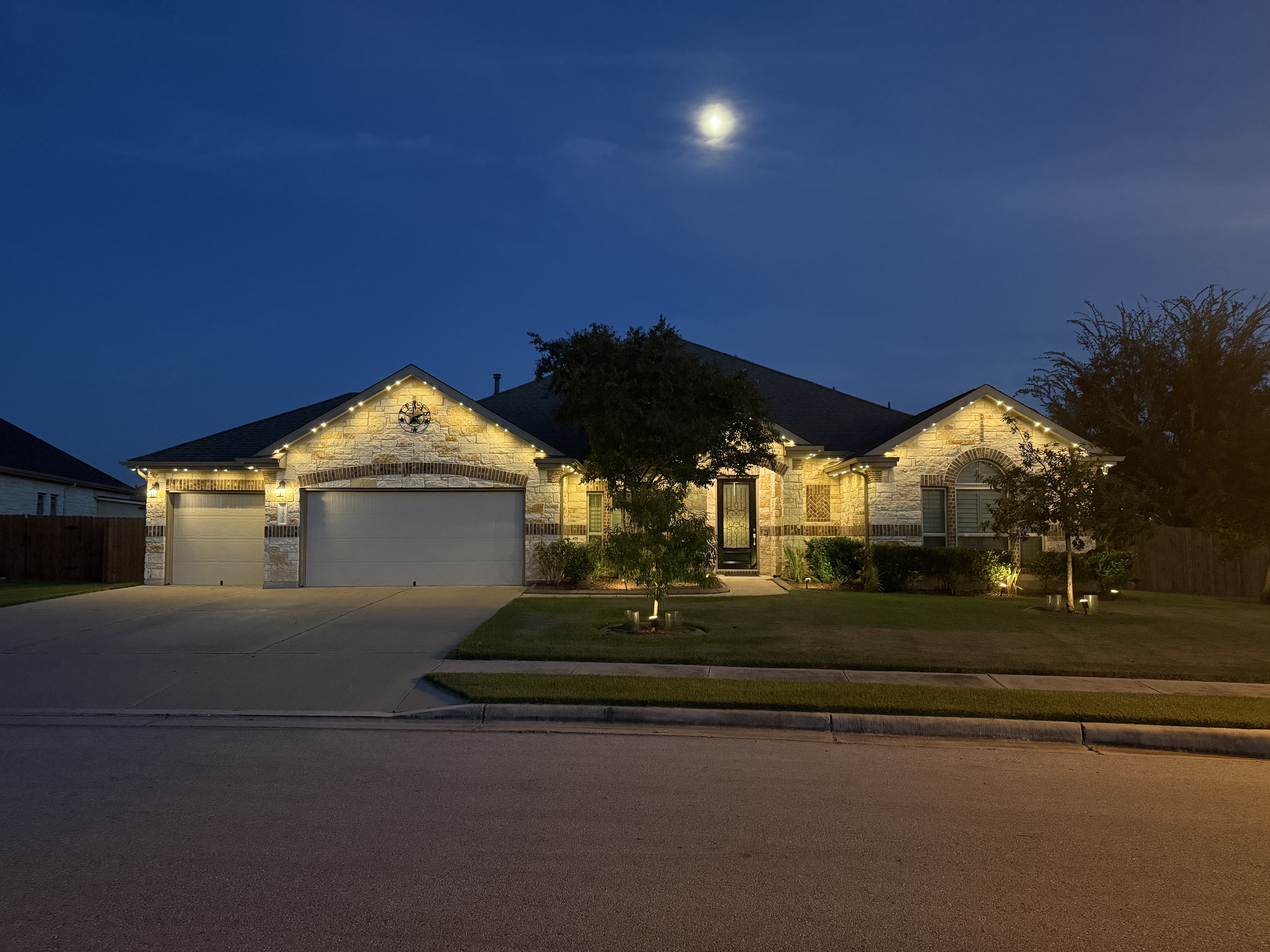 Same home illuminated in different architectural lighting scenes