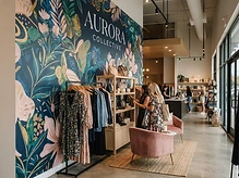Full wall vinyl wrap inside a retail store with eye-catching printed graphics covering the entire wall