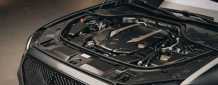 Luxury European vehicle engine bay and grille
