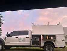 Service unit at dusk, doors open