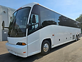 2009 MCI J4500 motorcoach, driver's side full length
