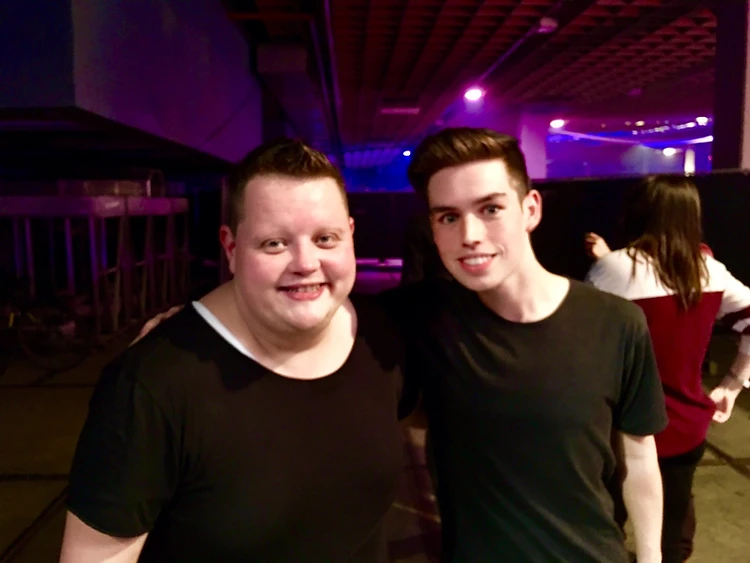 Garrett Gaudet with Ørjan Nilsen backstage at an event