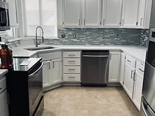 Quartz Kitchen with Glass Backsplash