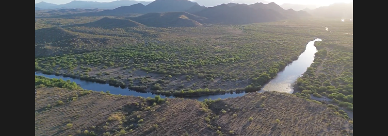 Aerial view of a river winding through the Tonto National Forest