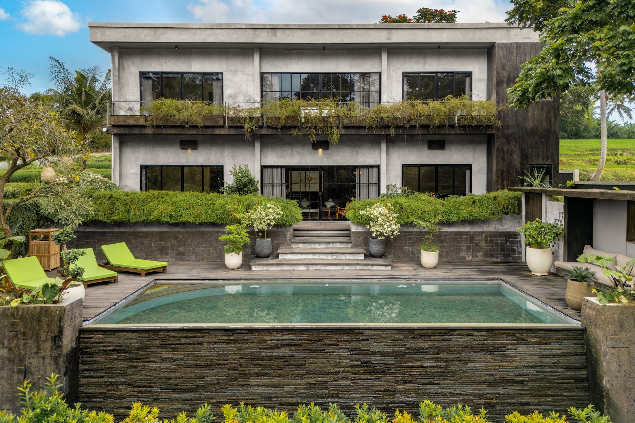 Amarell villa and pool surrounded by jungle