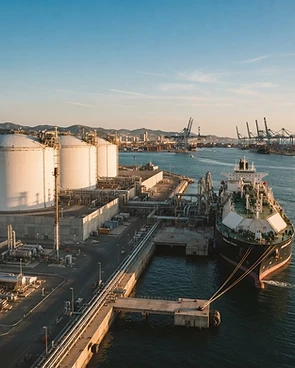 An LNG regasification terminal at a Spanish Mediterranean port, documentary photograph of European energy infrastructure