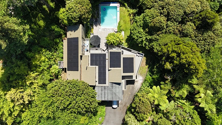 18 kW residential solar installation on a heavily treed Queenwood Hamilton home with north, flat and south-facing solar panels