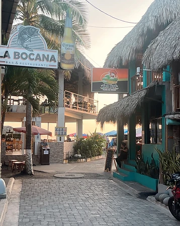 Cobblestone street in El Tunco at golden hour