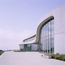 Curved building with soft periwinkle light