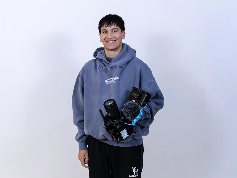 Cason holding a cinema camera