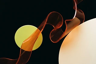 Abstract burnt-orange ribbon, lime disc and ivory plane against black
