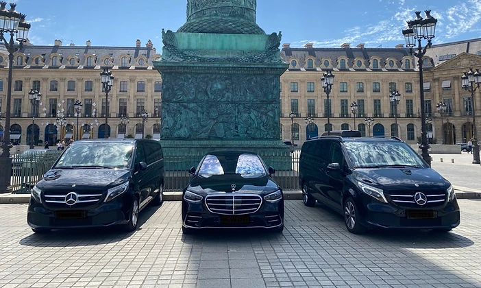 Two Mercedes Classe V and one Classe S lined up at Place Vendôme in Paris