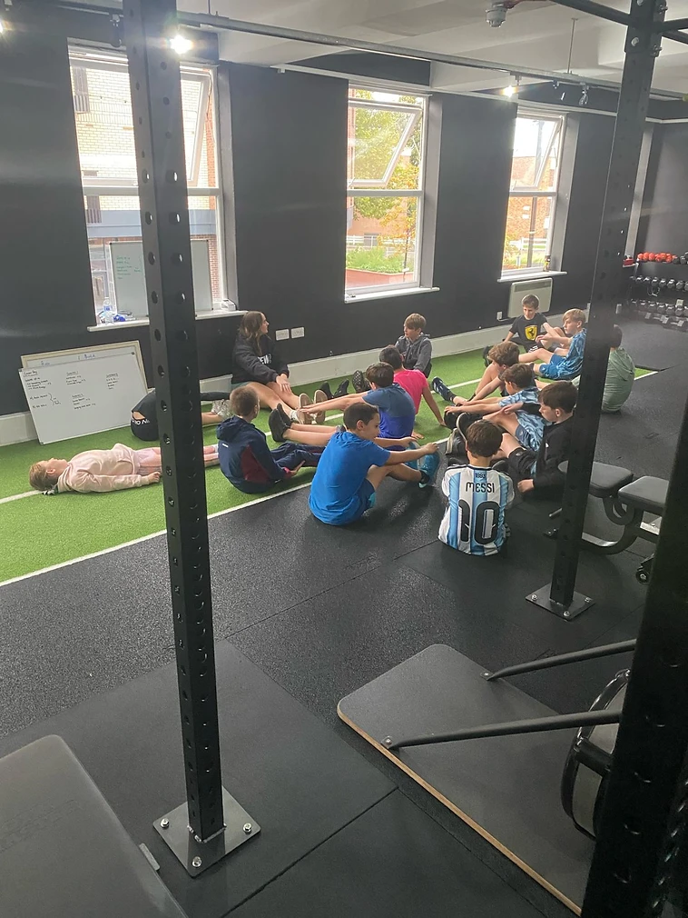 Kids warming up together at a Crew42 kids session in Crosby