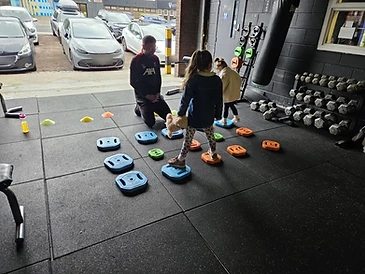 Kids balance and coordination drills with a coach