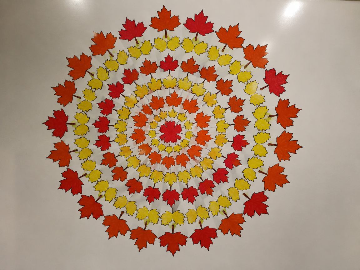 Maple leaf mandala whiteboard with symmetrical concentric leaf patterns