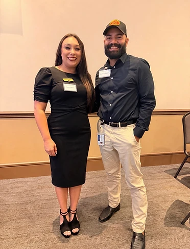 Cumbre Group staff representing the firm at a community partner event