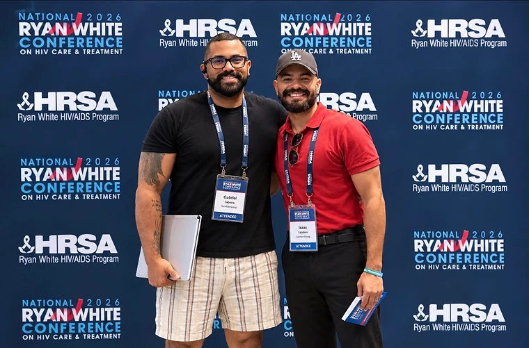Cumbre Group founder Issac Caballero with team member Gabriel Cabrera at the National Ryan White Conference on HIV Care and Treatment