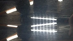 Black Cadillac paint with swirl marks before correction at GetRight Detailing in South Hackensack NJ
