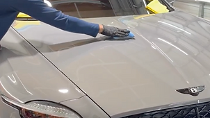 A ceramic coated car with water beading on the hood inside the GetRight Detailing shop in South Hackensack NJ