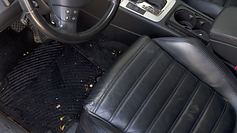Driver footwell and center console before detailing at GetRight Detailing in South Hackensack NJ