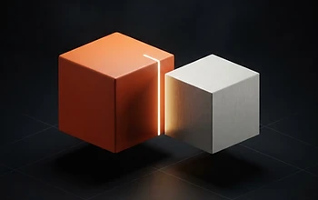 Orange and silver geometric cubes side by side