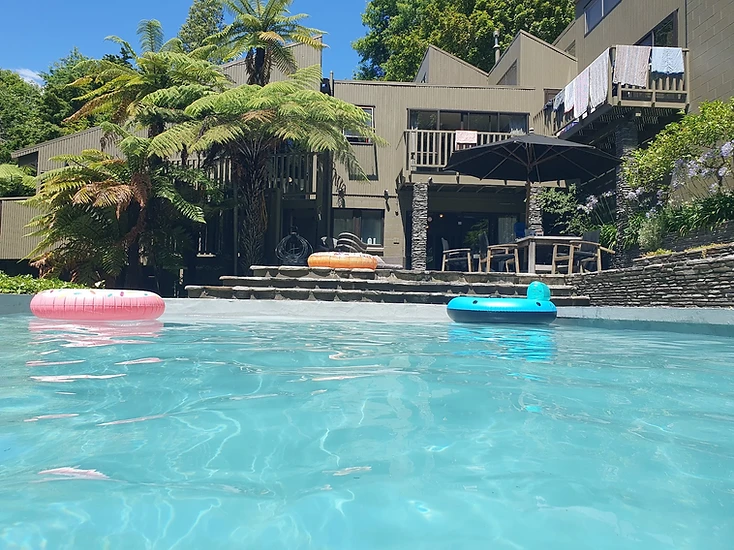 Residential swimming pool and outdoor living area with smart pool automation