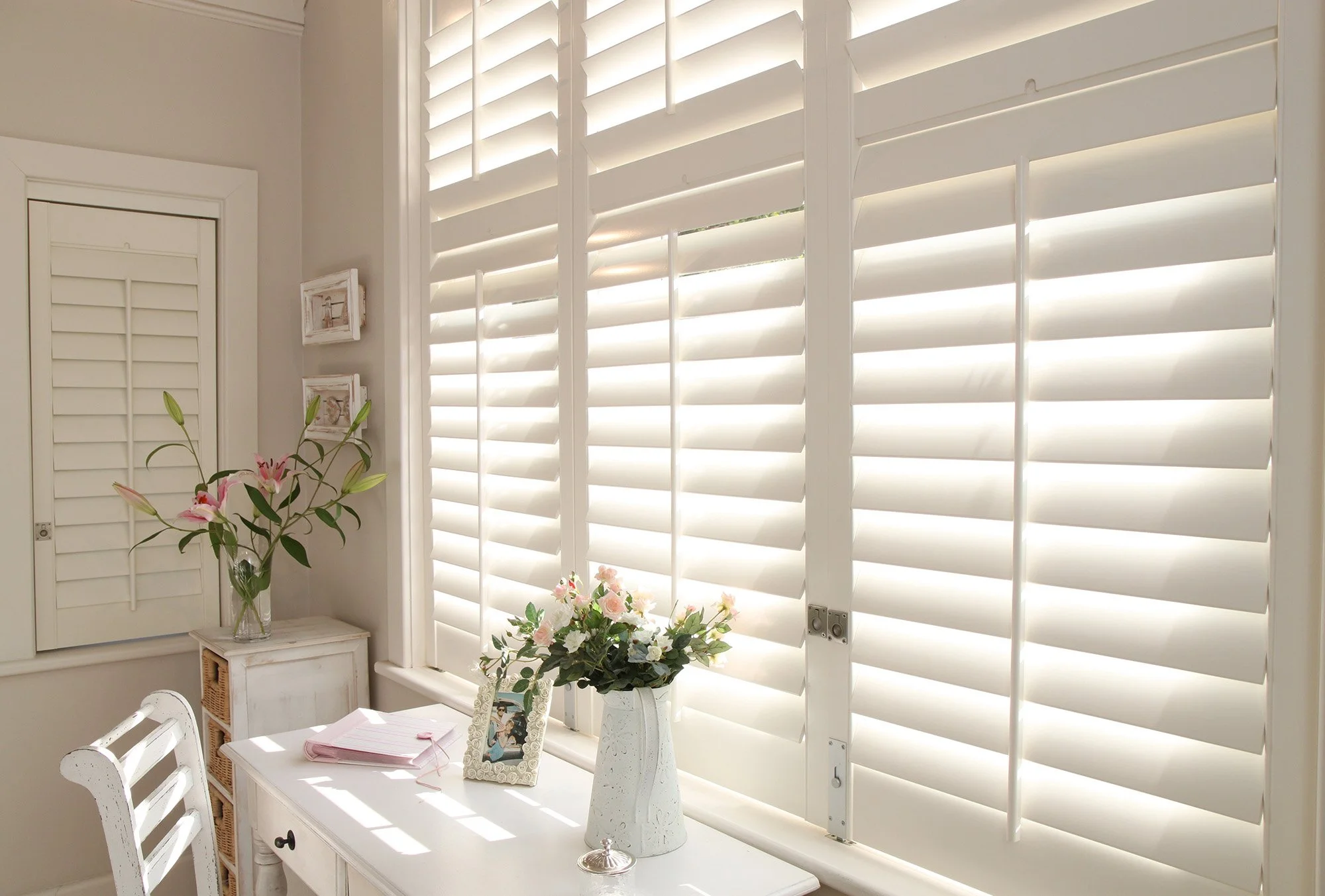 Full-height shutters for a bright home office — plantation shutters fitted in Cheltenham