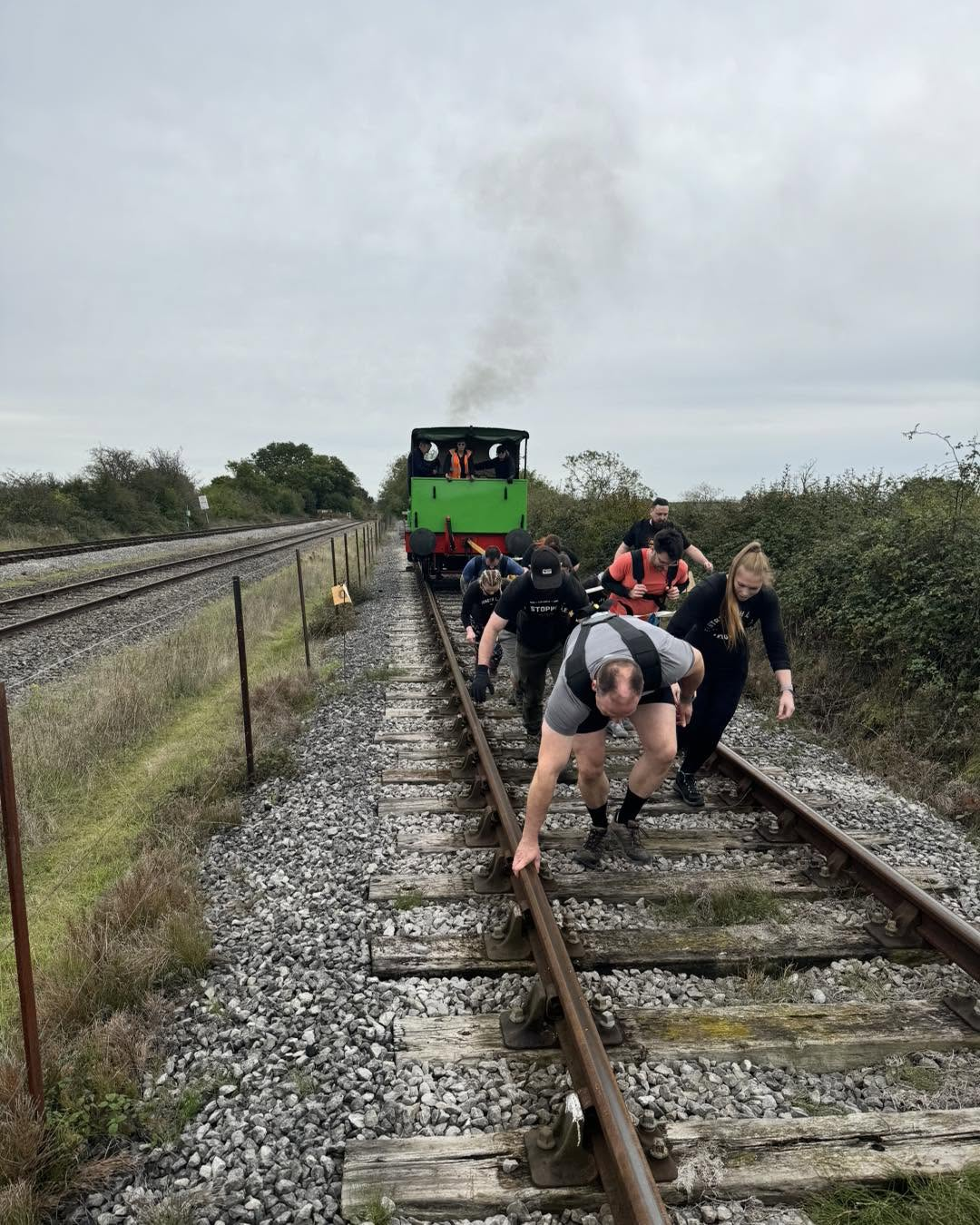 Team pulling a train in a challenge event