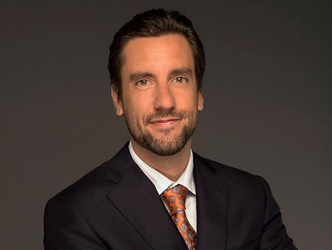 CLAY TRAVIS
