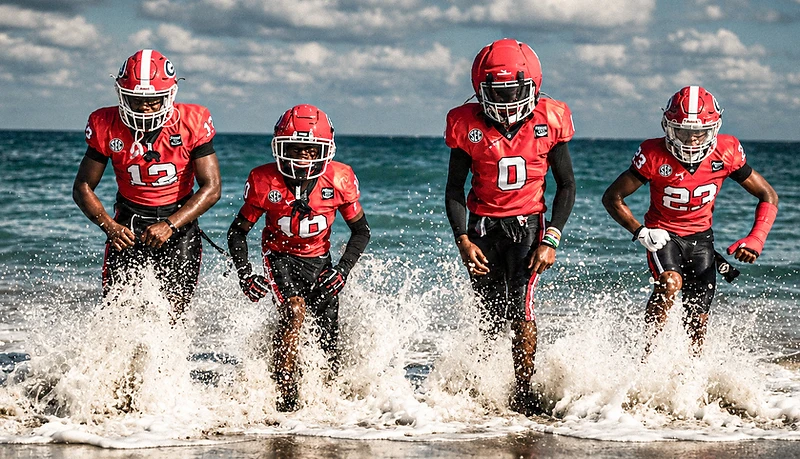 High school athlete running during VISIONATL game coverage in Georgia